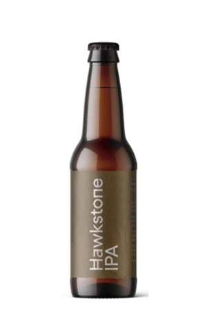 Brown glass beer bottle with a beige label reading 'Hawkstone IPA' vertically on the front.