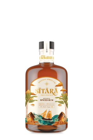 Bottle of Sitāra Indian Craft Rum, Botanical Spiced Rum, with tropical island label and ship artwork